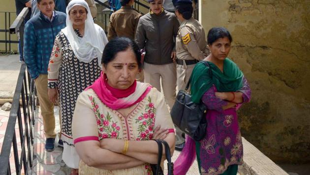 Relatives of assistant town and country planning officer Shail Bala Sharma wait at IGMC hospital in Shimla on Wednesday. The Supreme Court on Wednesday said the murder of the woman government officer during an anti-encroachment drive in Himachal Pradesh’s Kasauli was extremely serious and said that the hotel owner, who allegedly killed her, had brazenly defied its orders. (PTI) Relatives of assistant town and country planning officer Shail Bala Sharma wait at IGMC hospital in Shimla on Wednesday. The Supreme Court on Wednesday said the murder of the woman government officer during an anti-encroachment drive in Himachal Pradesh’s Kasauli was extremely serious and said that the hotel owner, who allegedly killed her, had brazenly defied its orders. (PTI)