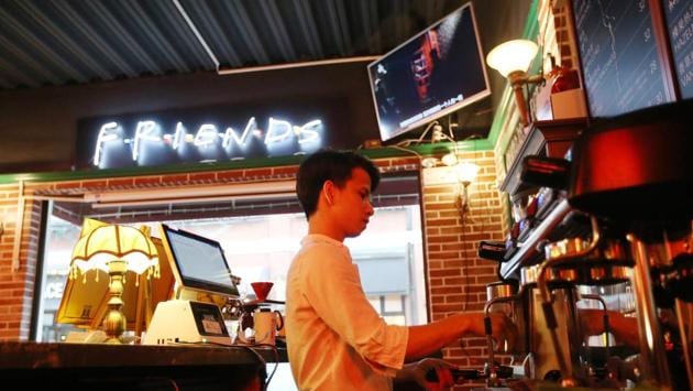 A staff member makes coffee at the Central Perk coffee shop in Shanghai. Coffees come with messages like “I (heart) Rachel” and “I’ll be there for you” traced into the foam, and customers frequently queue up outside on weekends. (AFP) A staff member makes coffee at the Central Perk coffee shop in Shanghai. Coffees come with messages like “I (heart) Rachel” and “I’ll be there for you” traced into the foam, and customers frequently queue up outside on weekends. (AFP)