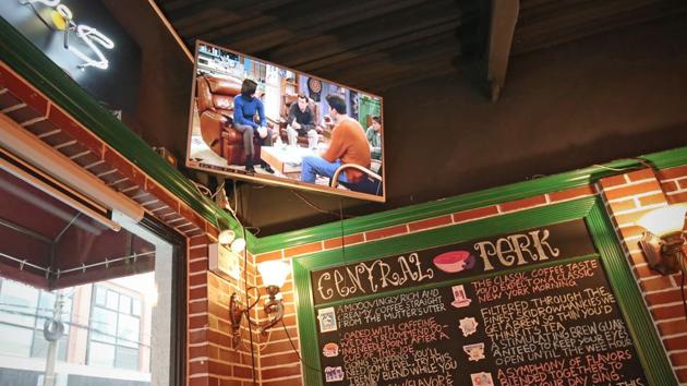 The proprietor is 39-year-old Du Xin, a Friends fanatic who calls the show his faith. He opened his first cafe in Beijing in 2009 and also has one in Guangzhou. They feature Central Perk’s signature window logo, big orange couch, and a TV that loops episodes all day. (AFP) The proprietor is 39-year-old Du Xin, a Friends fanatic who calls the show his faith. He opened his first cafe in Beijing in 2009 and also has one in Guangzhou. They feature Central Perk’s signature window logo, big orange couch, and a TV that loops episodes all day. (AFP)