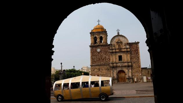 A tourist car in the shape of a tequila barrel is seen on a street in Tequila, Jalisco. The western state of Jalisco in Mexico is the heartland of the tequila industry, where ‘jimadores,’ the farmers of the agave cactus from which the spirit is distilled, have worked the fields for generations. (Carlos Jasso / REUTERS) A tourist car in the shape of a tequila barrel is seen on a street in Tequila, Jalisco. The western state of Jalisco in Mexico is the heartland of the tequila industry, where ‘jimadores,’ the farmers of the agave cactus from which the spirit is distilled, have worked the fields for generations. (Carlos Jasso / REUTERS)