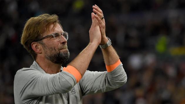 Liverpool's manager Jurgen Klopp applauds the fans following the UEFA Champions League semi-final second leg between AS Roma and Liverpool at the Olympic Stadium in Rome on May 2, 2018.(AFP)