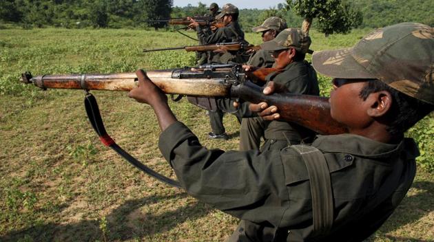 Maoists train in a forested area at Dumariya block in Gaya district recently.(AP File)