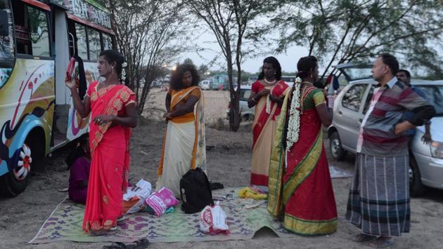 Transgender people, also known as ‘aravanis’ in Tamil, prepare to travel for the 18-day annual celebrations at Koovagam temple. There they will perform a ritual symbolising a wedding to Aravan, the deity of the temple and the son of Arjuna and his wife Ulupi. (Arun Sankar / AFP)