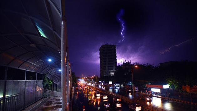 A bolt of lightning captured over the Delhi sky during the thunderstorm on Wednesday. More than 100 people died and many were injured due to the storm and squall that hit several states in north and west India.(Raj K Raj/HT photo)