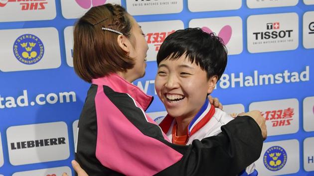 Seo Hyowon, right, from South Korea and Kim Song I from North Korea together in Halmstad on Thursday after North and South Korea combined their women’s teams at the table tennis team world championships.(AP) Seo Hyowon, right, from South Korea and Kim Song I from North Korea together in Halmstad on Thursday after North and South Korea combined their women’s teams at the table tennis team world championships.(AP)