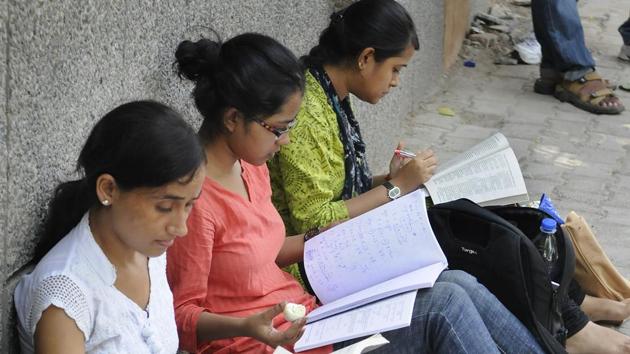Out of 52127 girls, 34705 or 66.5% cleared the exam and of the 34241 boys out of 56637 passed with a pass percentage of 60.4%. (HT file) Out of 52127 girls, 34705 or 66.5% cleared the exam and of the 34241 boys out of 56637 passed with a pass percentage of 60.4%. (HT file)