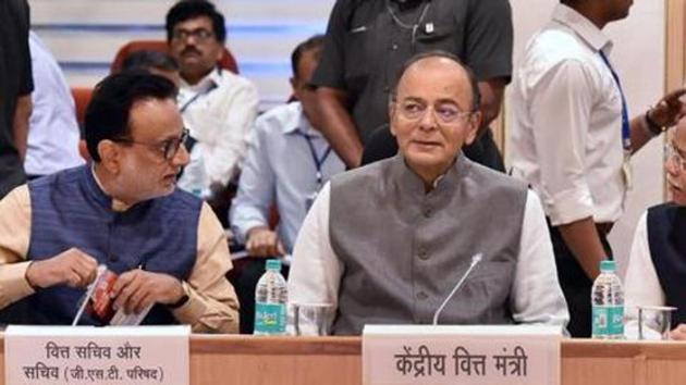 Union Finance Minister Arun Jaitley flanked by MoS for Finance Shiv Pratap Shukla and Revenue Secretary Hasmukh Adhia at the 26th meeting of the Goods and Services Tax (GST) Council, in New Delhi. (PTI File Photo) Union Finance Minister Arun Jaitley flanked by MoS for Finance Shiv Pratap Shukla and Revenue Secretary Hasmukh Adhia at the 26th meeting of the Goods and Services Tax (GST) Council, in New Delhi. (PTI File Photo)