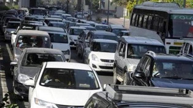 Besides an increased risk of accidents, more number of cars also means elevated pollution levels.(HT File) Besides an increased risk of accidents, more number of cars also means elevated pollution levels.(HT File)