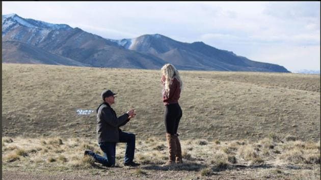 Levi Bliss proposed to his girlfriend of two years, Allison Barron. Their pictures have been going viral for a hilarious reason.(Twitter/allison_barron)