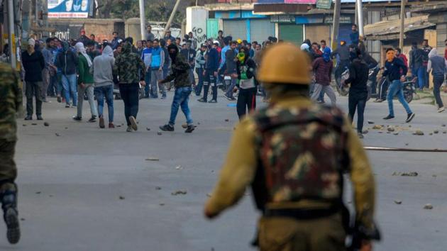 Youth throw stones at police personnel during clashes in Anantnag. Security forces have been accused of vandalism during mass protests in 2008, 2010 and 2016. (PTI) Youth throw stones at police personnel during clashes in Anantnag. Security forces have been accused of vandalism during mass protests in 2008, 2010 and 2016. (PTI)