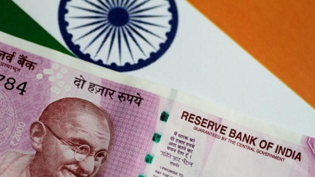 The rupee was trading one paisa higher against the US dollar at 62.63 in early morning deals on Friday.(Reuters File Photo) The rupee was trading one paisa higher against the US dollar at 62.63 in early morning deals on Friday.(Reuters File Photo)