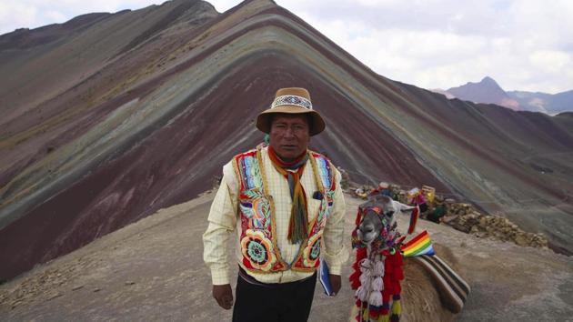 The local guides charge tourists $3 each to enter their ancestral land, netting the community roughly $400,000 a year. But the surge in tourists also comes with a responsibility to be good stewards of the environment and their new guests, and Pampachiri community leader Gabino Huaman admits he is not sure they are ready to fully handle it. (Martin Mejia / AP) The local guides charge tourists $3 each to enter their ancestral land, netting the community roughly $400,000 a year. But the surge in tourists also comes with a responsibility to be good stewards of the environment and their new guests, and Pampachiri community leader Gabino Huaman admits he is not sure they are ready to fully handle it. (Martin Mejia / AP)