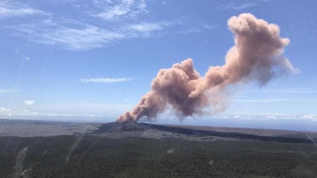 In this photo provided by the US Geological Survey, red ash rises from the Puu Oo vent on Hawaii's Kilauea Volcano after a magnitude-5.0 earthquake struck the Big Island in Hawaii Volcanoes National Park. (AP Photo) In this photo provided by the US Geological Survey, red ash rises from the Puu Oo vent on Hawaii's Kilauea Volcano after a magnitude-5.0 earthquake struck the Big Island in Hawaii Volcanoes National Park. (AP Photo)