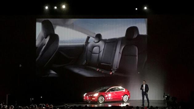 Tesla chief executive Elon Musk introduces one of the first Model 3 cars off the Fremont factory's production line during an event at the company's facilities in Fremont, California, US, July 28, 2017.(REUTERS File)