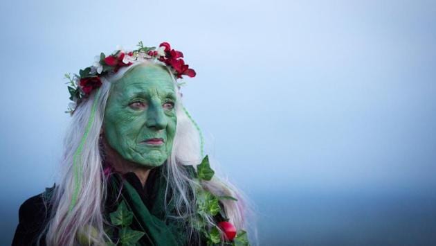 A woman looks towards where the sun is rising as people gather on Glastonbury Tor celebrating Beltane in Somerset, England. Beltane is celebrated by druids and pagans as the beginning of summer and the chance to celebrate the coming of the season of warmth and light. (Matt Cardy / Getty Images) A woman looks towards where the sun is rising as people gather on Glastonbury Tor celebrating Beltane in Somerset, England. Beltane is celebrated by druids and pagans as the beginning of summer and the chance to celebrate the coming of the season of warmth and light. (Matt Cardy / Getty Images)