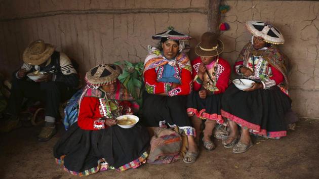 The guides dressed in colourful woollen clothes and wide-brimmed, traditional hats break for lunch. The flood of tourists has meant jobs and hard cash for the local Pampachiri community, which has struggled with high rates of alcoholism, malnutrition and falling prices of wool for their prized alpaca. Many have abandoned nomadic life for dangerous gold mining jobs in the Amazon. (Martin Mejia / AP) The guides dressed in colourful woollen clothes and wide-brimmed, traditional hats break for lunch. The flood of tourists has meant jobs and hard cash for the local Pampachiri community, which has struggled with high rates of alcoholism, malnutrition and falling prices of wool for their prized alpaca. Many have abandoned nomadic life for dangerous gold mining jobs in the Amazon. (Martin Mejia / AP)