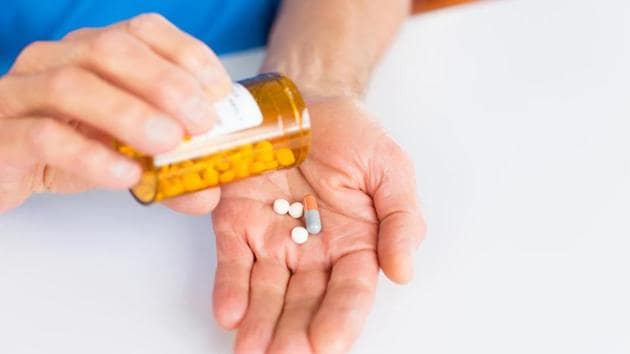 Cropped shot of hands removing prescription drugs from the bottle.(Getty Images/iStockphoto) Cropped shot of hands removing prescription drugs from the bottle.(Getty Images/iStockphoto)