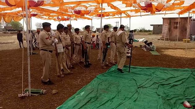 A police team reviews security arrangements before the start of the wedding at Mana village.(HT file photo)