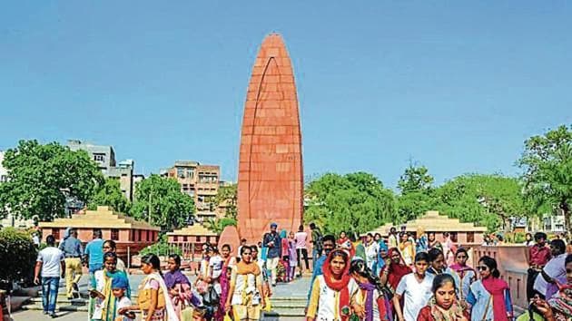 Visitors walk at the Jallianwala Bagh Memorial in Amritsar.(PTI File Photo)