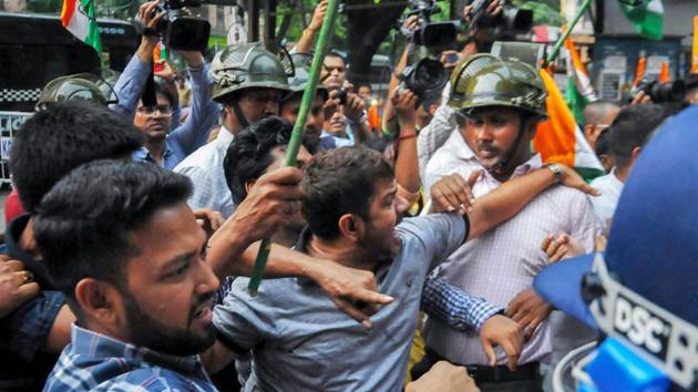 Police detain Congress activists who were protesting against fresh political violence in Kolkata, on April 23..(PTI file photo) Police detain Congress activists who were protesting against fresh political violence in Kolkata, on April 23..(PTI file photo)
