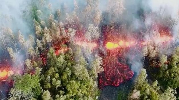 Lava emerges from the ground after Kilauea Volcano erupted, on Hawaii's Big Island May 3, 2018, in this still image taken from video obtained from social media. (REUTERS) Lava emerges from the ground after Kilauea Volcano erupted, on Hawaii's Big Island May 3, 2018, in this still image taken from video obtained from social media. (REUTERS)