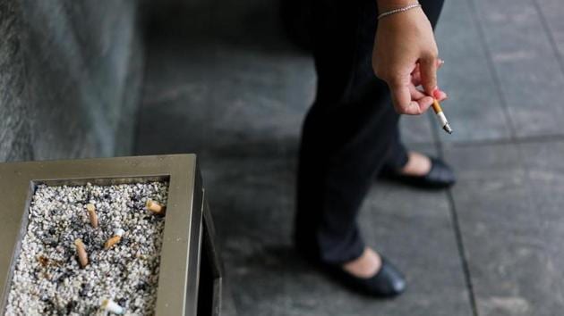 The woman said a man abused her for smoking and tried to snatch her cigarette.(AFP File/Representative image) The woman said a man abused her for smoking and tried to snatch her cigarette.(AFP File/Representative image)