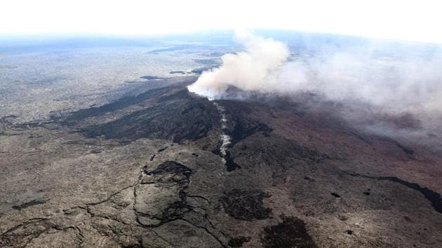 The Kilauea Volcano fissure that formed on the west flank of the Pu'u 'O'o cone (line of white steam) is seen in this aerial image after the volcano erupted following a series of earthquakes over the last couple of days, in Hawaii.. (USGS handout via Reuters Photo) The Kilauea Volcano fissure that formed on the west flank of the Pu'u 'O'o cone (line of white steam) is seen in this aerial image after the volcano erupted following a series of earthquakes over the last couple of days, in Hawaii.. (USGS handout via Reuters Photo)