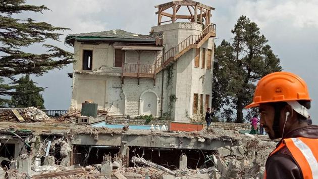 A partly demolished bungalow of hotelier Sanjay Narang in Landour area of Mussoorie in Uttarakhand.(HT Photo)