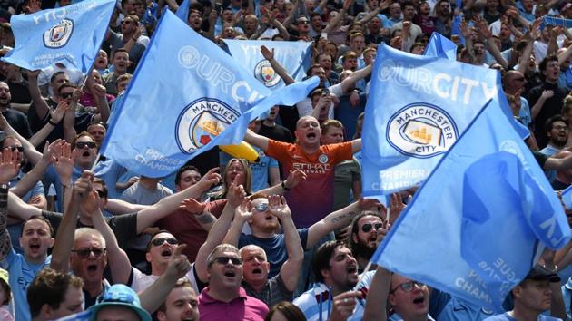 Mancester City fans were in fine voice in what was their second title of the season after winning the League Cup earlier in the campaign. (AFP) Mancester City fans were in fine voice in what was their second title of the season after winning the League Cup earlier in the campaign. (AFP)