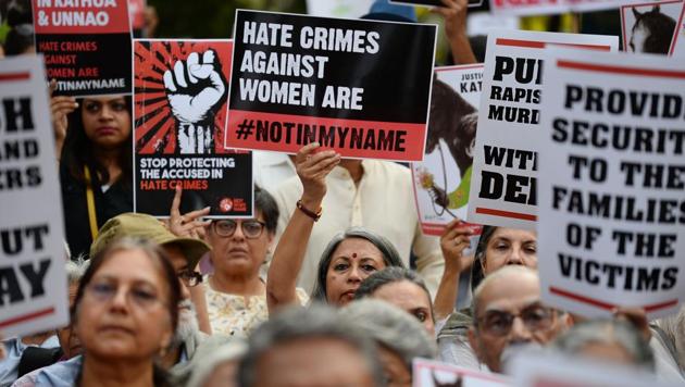 In this file photo taken on April 15, 2018, demonstrators hold placards during a protest against rape, in New Delhi. (AFP) In this file photo taken on April 15, 2018, demonstrators hold placards during a protest against rape, in New Delhi. (AFP)
