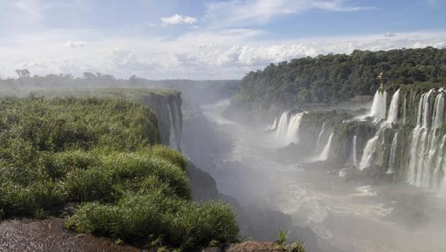 Overlooking Brazil from the precipice of Iguazu’s Devil's Throat in Argentina.(Naureen Malik/Bloomberg)