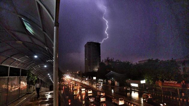 A view of lightening and sudden rain at ITO, New Delhi, India. (HT File Photo) A view of lightening and sudden rain at ITO, New Delhi, India. (HT File Photo)