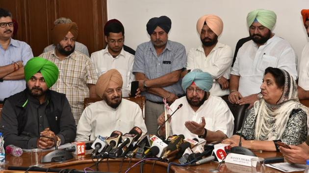 Capt Amarinder Singh addressing a press conference in Chandigarh on Monday.(HT Photo)