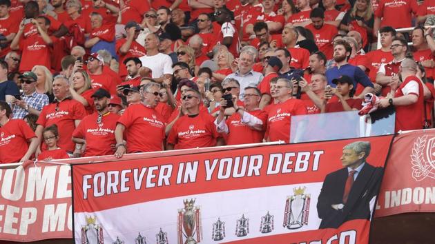 Arsenal's fans display a banner before the Burnley match. (AP) Arsenal's fans display a banner before the Burnley match. (AP)