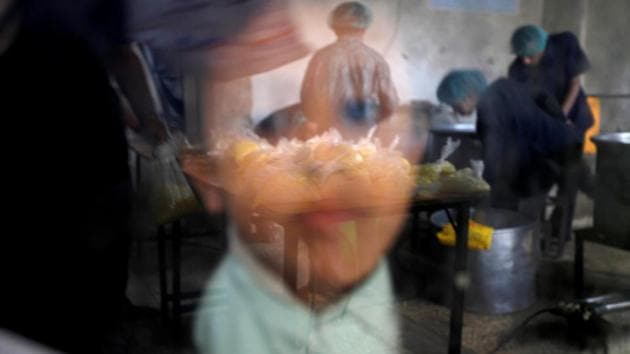 A boy waits his turn at a charity kitchen, which gives free food rations for the poor, in Sanaa. As coalition warplanes destroy schools and hospitals, seizing ports and thus relief, throughout the war-ravaged country, Yemeni mothers fight a war of their own for one meal a day to save their children from starvation. (Mohamed al-Sayaghi / REUTERS) A boy waits his turn at a charity kitchen, which gives free food rations for the poor, in Sanaa. As coalition warplanes destroy schools and hospitals, seizing ports and thus relief, throughout the war-ravaged country, Yemeni mothers fight a war of their own for one meal a day to save their children from starvation. (Mohamed al-Sayaghi / REUTERS)