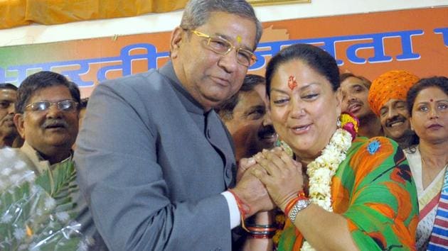 Ghanshyam Tiwari with CM Vasundhara Raje in good times.(HT File Photo)