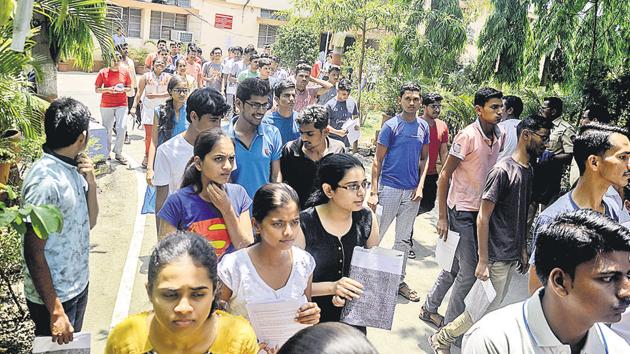 Students walk out of Kendriya Vidyalaya BEG, Yerawada, after the NEET exams on Sunday.(HT Photo)