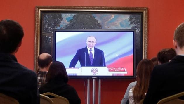 Journalists watch a ceremony to inaugurate Vladimir Putin as President of Russia at a press centre in Moscow, Russia.(Reuters Photo) Journalists watch a ceremony to inaugurate Vladimir Putin as President of Russia at a press centre in Moscow, Russia.(Reuters Photo)