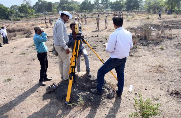 District authorities conducting joint measurement survey in Shil village, Thane on Monday. (HT PHOTO) District authorities conducting joint measurement survey in Shil village, Thane on Monday. (HT PHOTO)