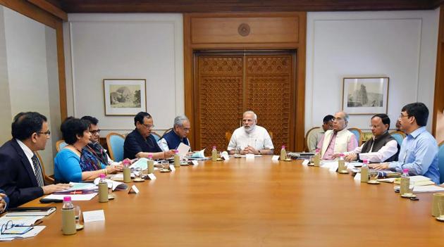 Prime Minister Narendra Modi reviews the preparations for the launch of a health assurance programme under Ayushman Bharat, in New Delhi on Monday.(PTI Photo)