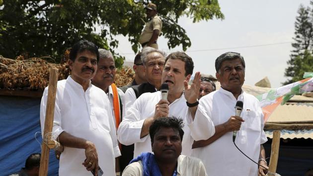 Congress party president Rahul Gandhi addresses his supporters while campaigning for Karnataka state legislative elections in Malur on May 7. (AP Photo) Congress party president Rahul Gandhi addresses his supporters while campaigning for Karnataka state legislative elections in Malur on May 7. (AP Photo)