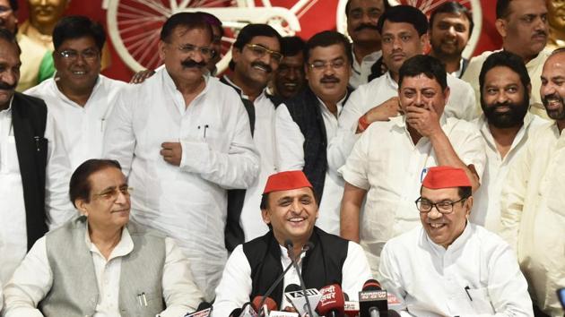 Samajwadi Party president Akhilesh Yadav and other senior leaders address a press conference after the by-election results, at the party headquarters in Lucknow on Wednesday.(PTI File Photo)