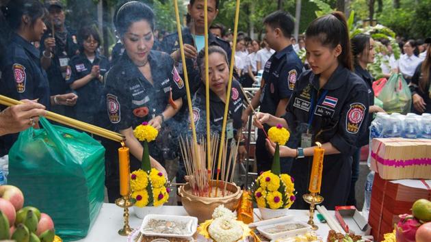 Volunteers light incense during the religious ceremony by Chulalongkorn University medical students. Rituals honouring medical cadavers are a common practice in Thailand, where the ceremonies fuse elements of Hinduism with the country’s majority Buddhist faith. (Romeo Gacad / AFP) Volunteers light incense during the religious ceremony by Chulalongkorn University medical students. Rituals honouring medical cadavers are a common practice in Thailand, where the ceremonies fuse elements of Hinduism with the country’s majority Buddhist faith. (Romeo Gacad / AFP)