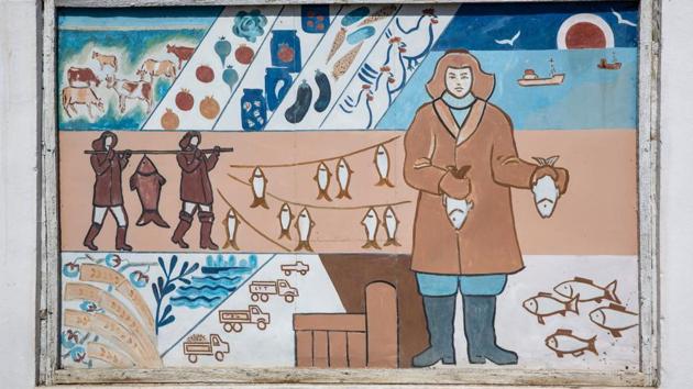 But as irrigation projects for cotton farming in the Soviet Union  diverted the rivers that fed the Aral Sea, the area started desiccating steadily. Today, Moynaq is a ghost town with murals and signs across the city depicting a past in stark contrast with its arid landscape. (Taylor Weidman / Bloomberg) 