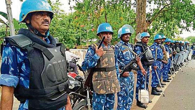 RAF personnel deployed near Aligarh Muslim University on Tuesday.(HT Photo)