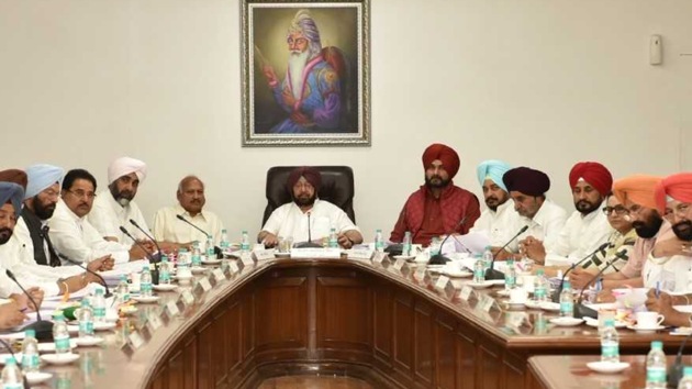 Punjab chief minister Captain Amarinder Singh presiding over the Cabinet meeting at CMO, Chandigarh on Tuesday. (HT Photo) Punjab chief minister Captain Amarinder Singh presiding over the Cabinet meeting at CMO, Chandigarh on Tuesday. (HT Photo)