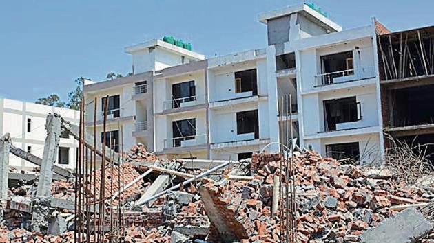 The underconstruction four-storeyed building was coming up at Peer Muchalla in Zirakpur. It collapsed on April 12. (HT File) The underconstruction four-storeyed building was coming up at Peer Muchalla in Zirakpur. It collapsed on April 12. (HT File)