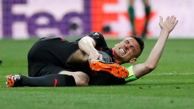 Arsenal's Laurent Koscielny reacts after sustaining an injury vs Atletico Madrid in the second leg of the UEFA Europa League semi-final at the Wanda Metropolitano on May 3, 2018.(REUTERS) Arsenal's Laurent Koscielny reacts after sustaining an injury vs Atletico Madrid in the second leg of the UEFA Europa League semi-final at the Wanda Metropolitano on May 3, 2018.(REUTERS)