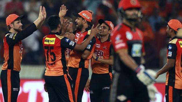 Sunrisers Hyderabad (SRH) bowler Shakib Al Hasan , 2nd form left, celebrates with Yusuf Pathan the wicket of Royal Challengers Bangalore (RCB) skipper Virat Kohli during their IPL 2018 match in Hyderabad on Monday.(AP)