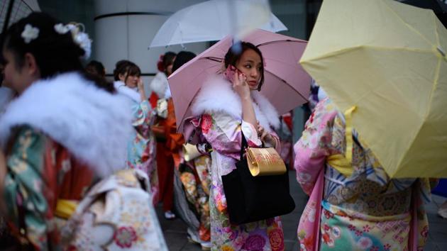 Women wearing kimonos gather after attending the ‘Coming of Age Day’ ceremony in Yokohama, Japan. Yajima (not pictured) has nearly doubled his number of customers in the past 15 years by selling more kimonos under the 100,000-yen ($930) price tag, well below the many thousands of dollars a high-end piece can cost. “The industry will grow if we can create a market in which as many people as possible will buy a kimono,” he said. (Getty Images) Women wearing kimonos gather after attending the ‘Coming of Age Day’ ceremony in Yokohama, Japan. Yajima (not pictured) has nearly doubled his number of customers in the past 15 years by selling more kimonos under the 100,000-yen ($930) price tag, well below the many thousands of dollars a high-end piece can cost. “The industry will grow if we can create a market in which as many people as possible will buy a kimono,” he said. (Getty Images)